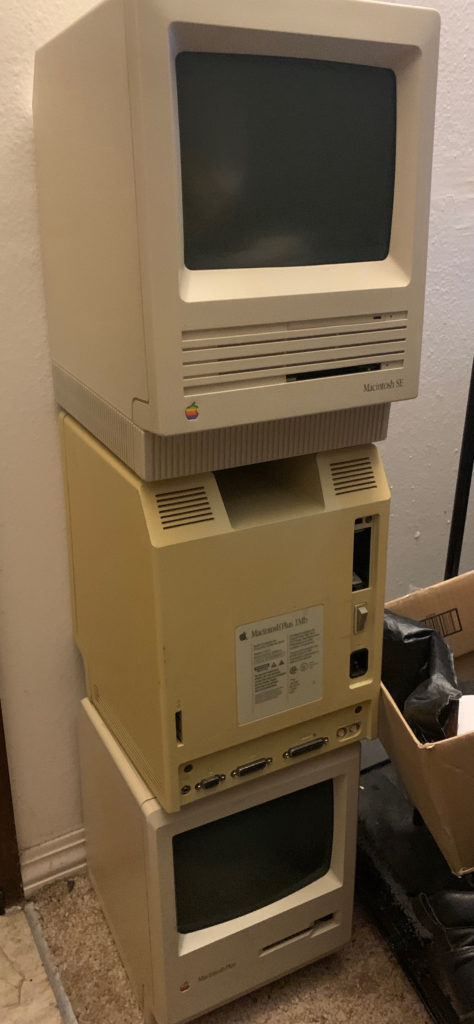 Another Macintosh SE and two Macintosh Plus computers, being patient and taking their time